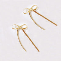 Long bow tie studs Jewellery Morandi Homeware Gold